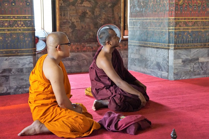 Two monks in a temple