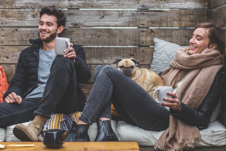 Enjoying coffee with a pet friend