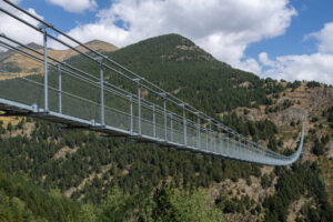 Canillo Sitting 1875 meters above, the Canillo Tibetan Bridge spans across Andorra's breathtaking natural beauty, a colossal wonder.
