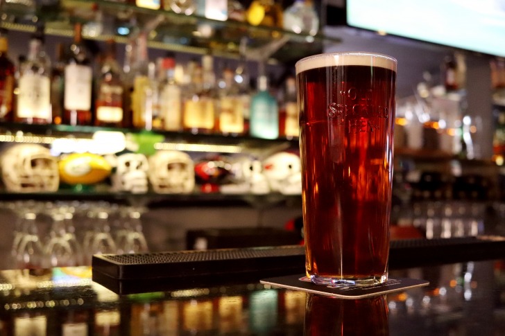 A glass of beer at the bar