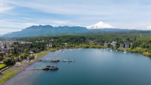 Pucon Aerial view of the city of Pucón, in southern Chile. The Villarrica Volcano can be seen in the background.