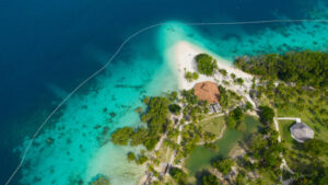 Tropical island with beach. Malipano island, Philippines, Samal.