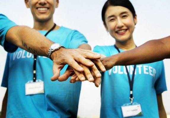 Volunteers smiling