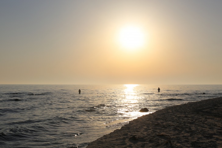 Anglers in the sea