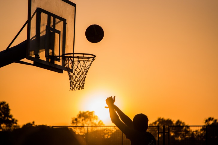 Man playing basketball