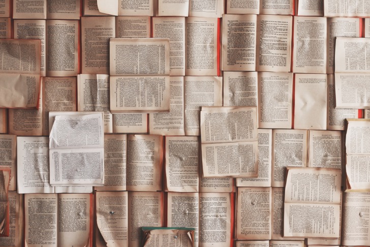 Lots of opened books on the table