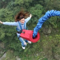 Girl bungee jumping