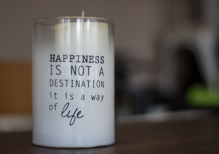 Candles with inspirational inscription