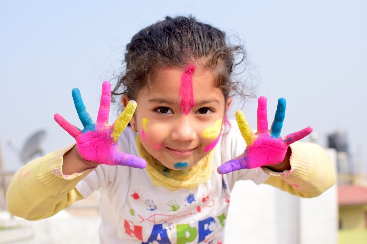 Indian girl with colorful hands