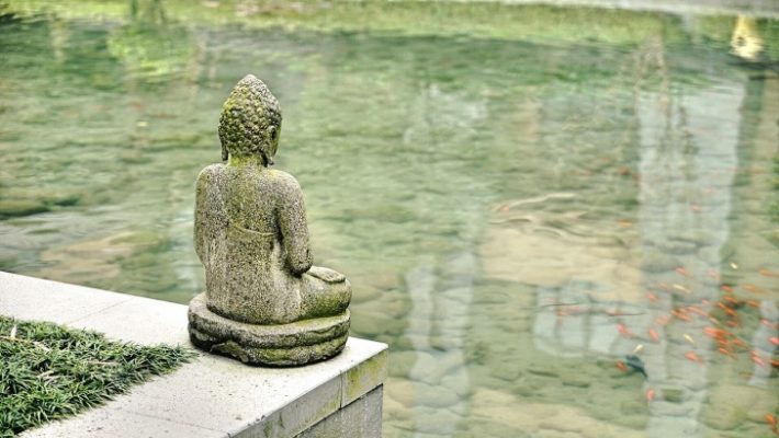 Statue on a pond