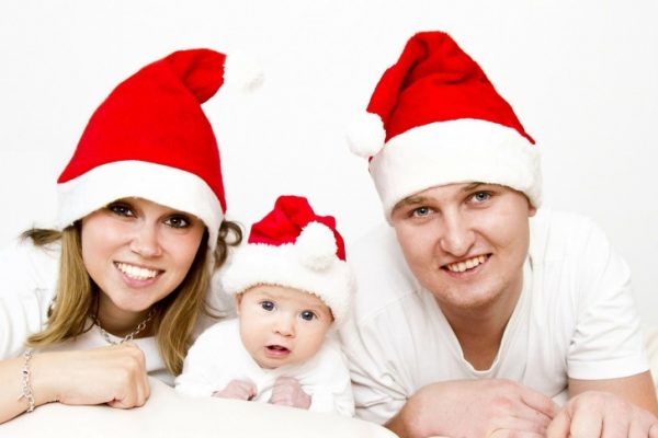 Family with Santa's hats