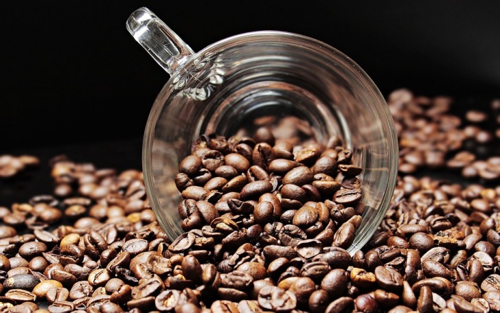 Coffee beans in a glass cup