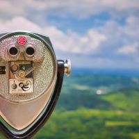 Coin operated binocular