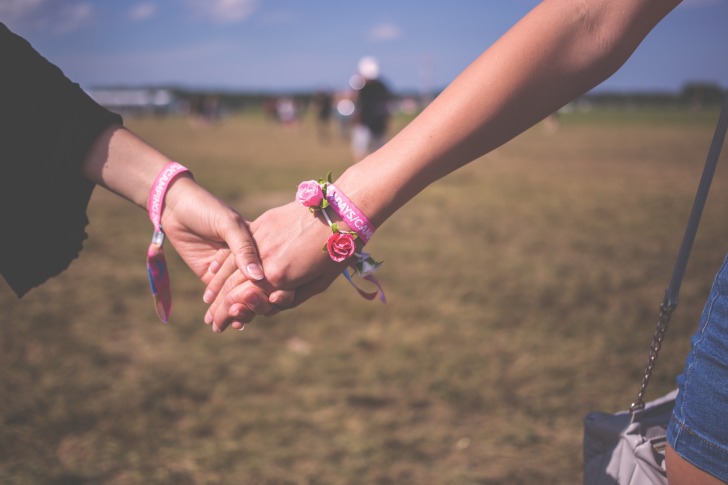 Girls holding hands