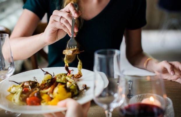 A woman at a restaurant