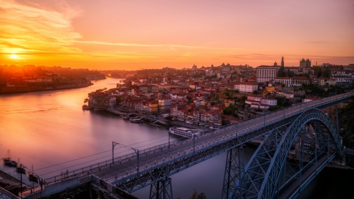 Gray bridge near building at sunset, Porto