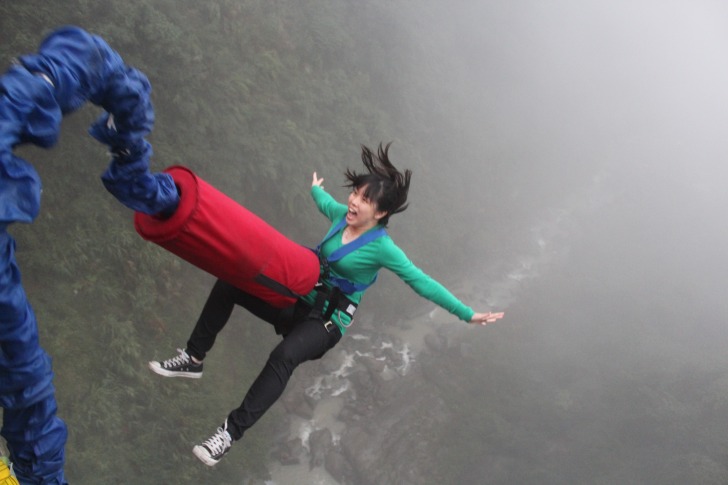 Bungee jumping girl yelling