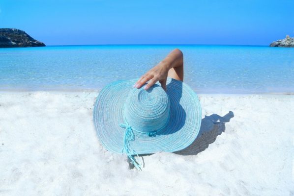 A girl wearing a blue hat