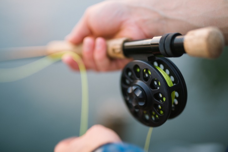 Fishing rod in hands