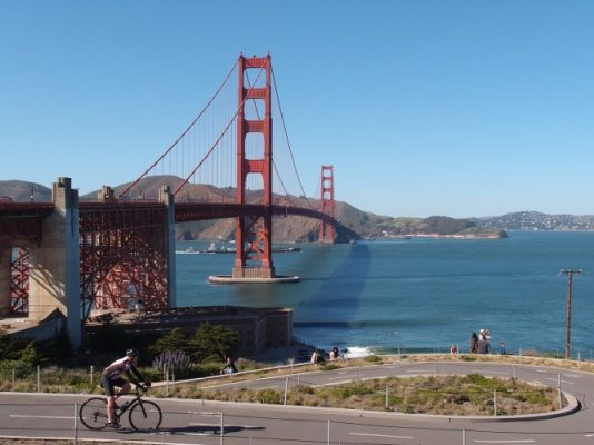 Cycling by the bridge