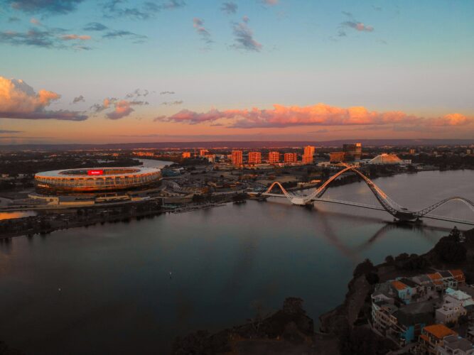 Burswood Peninsula in Perth, Western Australia, featuring the Optus Stadium at sunset