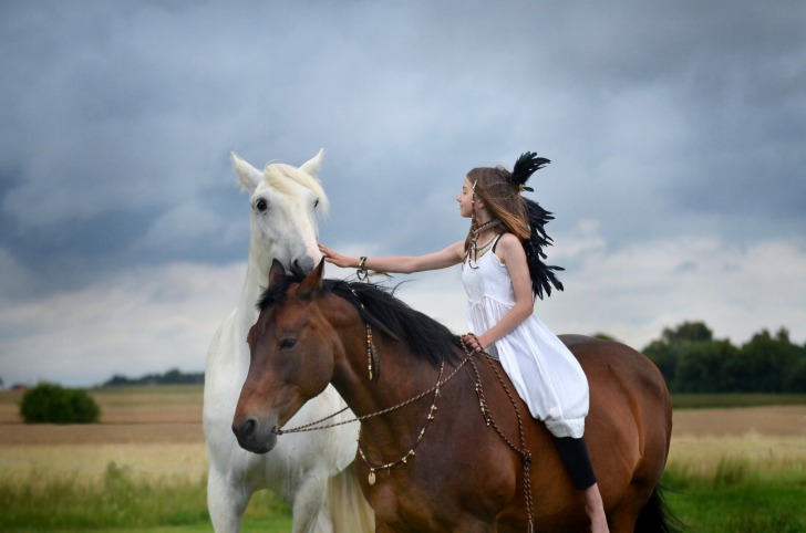 Girl horse riding