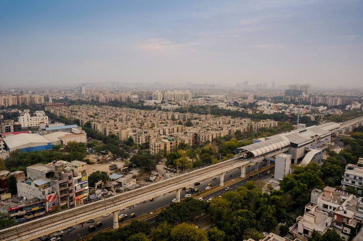 Aerial cityscape shot of Noida, delhi, grugaon at dusk night