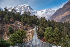 Suspenion bridge in Manaslu circuit trekking route, Himalayas mountain range in Nepal, Asia