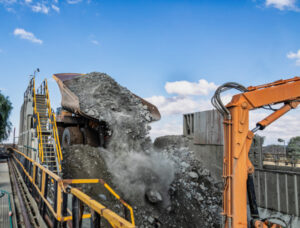 Jwaneng Huge truck unloading kimberlite in a crusher