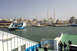 Port Fuad car ferry pier and white mosque. Port Said, Egypt