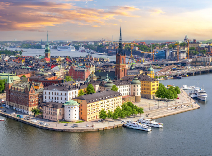 Stockholm old town (Gamla Stan) panorama from City Hall top at sunset, Sweden
