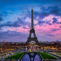 Beautiful spring evening view of the Eiffel Tower and skyline of Paris, France