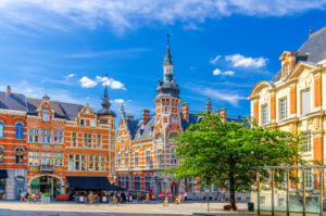 Leuven Old Post Office House Leuven brick building in Leuven city historical center in sunny summer day, Flemish Region, Flemish Brabant province, Belgium