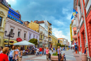 Plovdiv Colorful buildings and people walking on Plovdiv main street