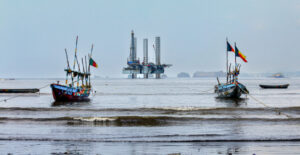 Limbe Traditional Fishing Boats and Offshore Oil Platform in Limbe, Cameroon