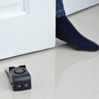 Door alarm placed behind a door