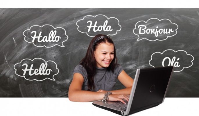 A girl working on a laptop