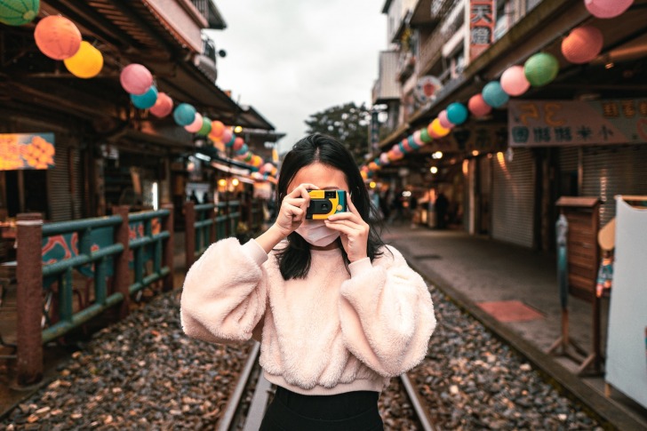 Student taking photos on her travels