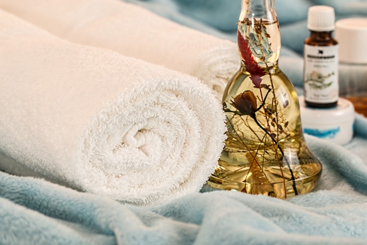 Spa oil and towel