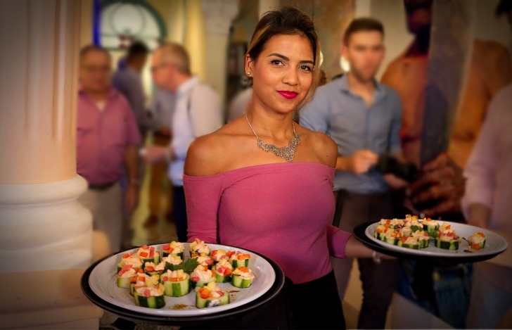 Girl serving dishes