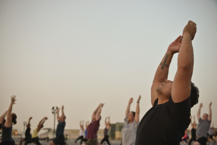 Men doing yoga