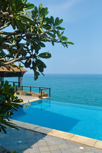 Infinity pool overlooking the ocean at The Leela Kovalam, A Raviz Hotel in Kovalam, Kerala, India