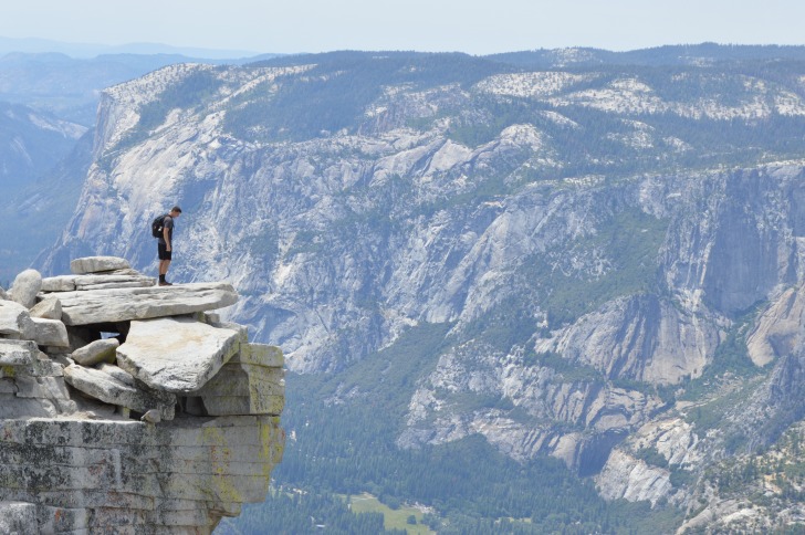 Man standing on the edge of canyon