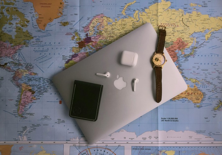 Laptop on top of a map