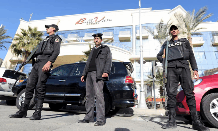 Security personnel standing guard outside the Bella Vista Hotel in the Red Sea resort of Hurghada, Egypt