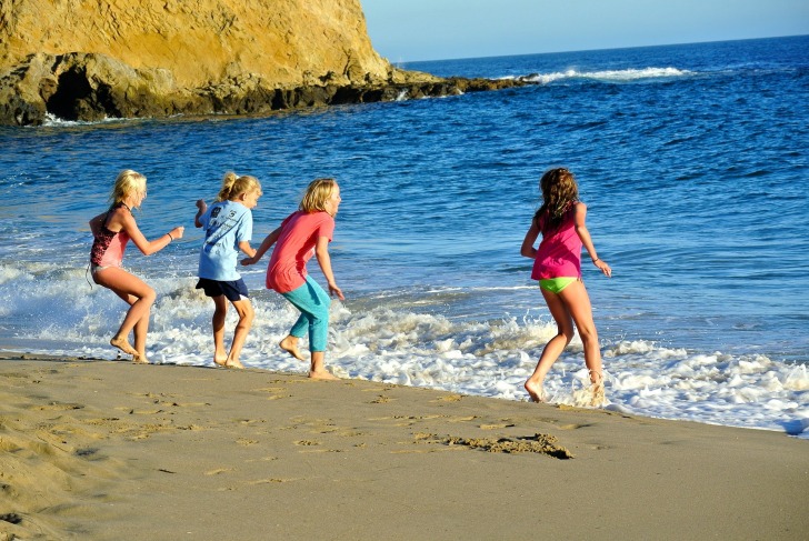 Girls playing on Laguna Beach
