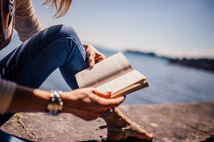 A girl reading her favorite book