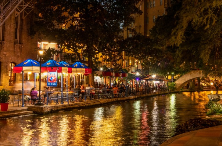 San Antonio River Walk at night, a famous urban waterway filled with restaurants and shops in San Antonio, Texas