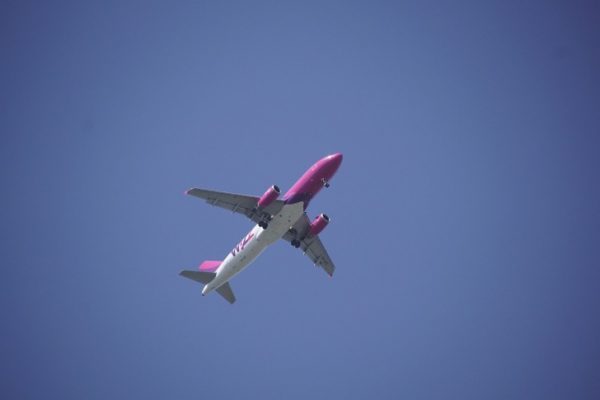 A plane in the blue sky