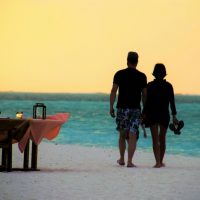 walking on the beach for a romantic dinner